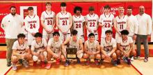 It takes teamwork to get to NSAA State! Here the Badgers hold their District Class 2 Championship plaque after defeating Hemingford. Only time and determination will tell if they’ll become NSAA State Champions as well. Photos by NIna-Maria Nelson