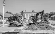 Kirk Barnes Construction readies the front of the Cherry County Justice Center for the placement of new cement and the re-homing of the veterans monuments.