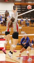 The Lady Badgers are pictured against West Holt in a previous game where sophmores Clarrah Beebout #1 and Annalena Nelson #5 are blocking at the net. Photos by Nina-Maria Nelson