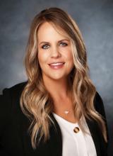 Talia Benson earns CDFA designation.