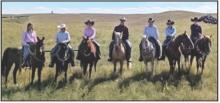Students, faculty, and the clinician stand in front of pairs after returning them to pasture at the Leu Ranch. Pictured are from L to R: Karah Barnes, Jessica Rodman, Jaidin Miller, Ryan Sexson, August Skow, Ciara Peterson, and Madison Wilson.
