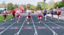 Pictured are the Badgers during the 100 Meter Dash : Jackson Huggins - lane 1, Isaac Utecht - lane 3, Dominic Beebout - lane 4, and Trystan Beebout - lane 5. 