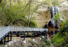 The new boardwalk, constructed of composite decking on a steel frame, leads visitors to Smith Falls. Photo by Justin Haag/NGPC