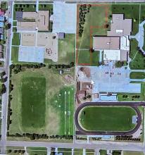 Outlined in red, the proposed wellness center will have a 72 space parking lot that is accessed from Fifth Street, which is facing north in this image.