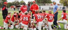Pictured above, the 12U team learned the fun-damentals of tackle football.