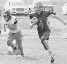 Byron Skinner running the ball down the field during Cody-Kilgore’s Homecoming victory against Minatare. Photos by Shontell Roseberry