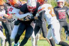 Jasper Roseberry #21 and Jacob Knox #23 tackling a Parkview Patriot. Photos by Shontell Roseberry