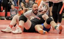 Haddison Mundorf gets the pin against the Lady Mustang from Gordon-Rushville.