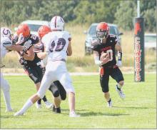 Cowboy linemen making a path for Cooper Fay #10 in the game against the Stuart Broncos, September 8, 2023. The Cowboys lost with a score of 27-35. Friday, September 15, 2023, the Cowboys traveled to Santee and won with a score of 52-12. Scoring by quarters: Cody-Kilgore - 6, 18, 22, 6 = 52; Santee - 0, 6, 6, 0 = 12. Friday, September 22, the team will host Minatare.