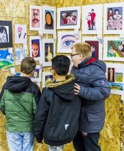 The fourth grade students got a chance to see the art that on display. These young men were enjoying exhibit.