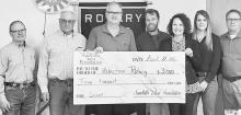 Pictured are from L to R: Monty Neiffer, Duane Kime, Bruce Johnson, Todd Madison, Kimberly Johnson, Talia Benson and Steve Brown.