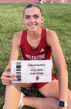 Maeli Patterson finishes as District Champion in the 200 Meter Dash.