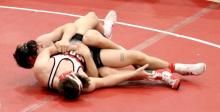 Trace Buechle wrestled at 165 pounds.