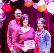 Dan and Jerilyn Colburn were presented with the Heart City Heart Award by Jill Joseph-Austin.
