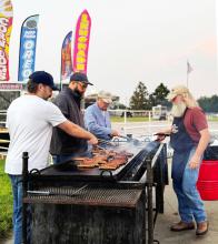 Pictured manning the grill are Foundation members Eric Hofferber, Jud Hoffschneider, Steven Isom, and Rourke Springer.