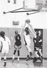 Sadee Adamson #24 goes up for some points in the game against Mullen held Friday, December 17, 2021. Photo by Shontell Roseberry