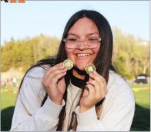 CK freshman Aubryanna Schmit shows off her medal haul from the Neligh-Oakdale Invite. Schmit broke the meet shot put record set in 1996 and beat her previous school shot put record by over one foot. Schmit also won the girls’ discus event at the Neligh-Oakdale Invite.