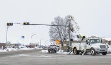 At the intersection of Main Street - Highway 83, and Highway 20, IES works on wiring the traffic signals. Photo by Laura Vroman