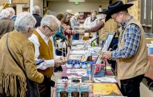 There were plenty of guests at the 32nd annual Old West Days and Poetry Gathering event bringing commerce to Valentine. Once the poetry and music sessions had concluded, it was to the trade show to pick up the poets and musicians CDs, books, and the annual Old West Days mug. Photos by Laura Vroman
