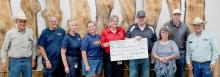 Pictured at left, from L to R: Tim Nollette, Steve Garwood, Kay Reese, Wendy Murphy, Christine Lousias, Duane Lamb, Shirley Kroeger, Doug Kroeger, and Greg Nollette who donated to Cherry County Ambulance.