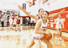 Alivia Patterson #2 protects the ball in an attempt to get it to her teammate, Friday, February 2, 2024.