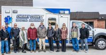 Pictured in front of the brand new Cherry County Hospital Ambulance are from L to R: Monty Kneifer, Duane Lamb, Dave Nelsen, Nadeane Allard, Rourke Springer, Josh Krueger, Jessica Abbott, Lacey Joseph, Talia Benson, Steve Isom, and Jim Bargen. Photos of other equipment on page 10. Photo by Laura Vroman