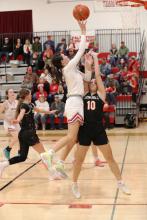 Aiden Hand #2 with a VHS layup as CK #10 tries to block. Photos by Nina Maria Nelson