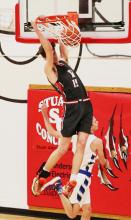 Isaac Cronin #15 dunks the left side!! Photos by Nina Maria Nelson
