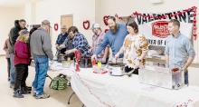 Pictured at the Chili Cook-off are from L to R: Chamber of Commerce Executive Director Dean Jacobs, Noah Barber, Jason Hobelheintrich, Chris and Lindsey Hernstrom, and 2023 Cupid’s Chili Cook-off champion is Mitch Elliott. Photos by Laura Vroman