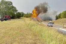 A fire began after a semi accident occurred Thursday, August 4, 2022. You can see the semi at the bottom right, and the fire that ignited and got into the trees which kept firefighters busy. Courtesy photo