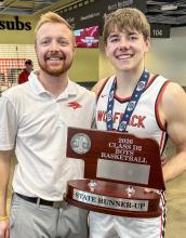 Pictured with Jarek Erickson is coach Matt Euse, who was selected as the Class D2 coach of the year.