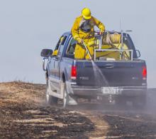 Keeping the fire at bay on the Cut Across Road fire, Tuesday, March 22, 2022. Photos by Laura Vroman