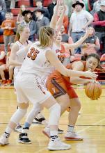 Malika Monroe gets trapped along the baseline by Ainsworth players and is able to dish the ball to a Valentine player.