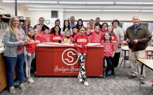 A Ribbon Cutting was held at Valentine Elementary School, Thursday, October 12, for the Sandhills State Bank student branch savings program.