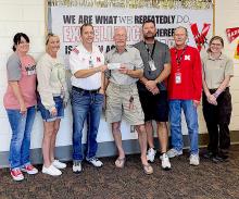 Pictured are from L to R: JJ Thorpe. Alison Larsen, Jeff Sayer, Sandhills Prairie Refuge Association Gordon Warrick, Nick Larsen, David Schultz, Katie Patterson.