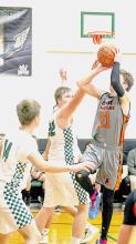 Jasper Roseberry #21, driving into the lane against the Knights. The Cowboys hosted Bennett County and won over the Knights with a score of 54-39, Thursday, February 9, 2023. Photos by Shontel Roseberry