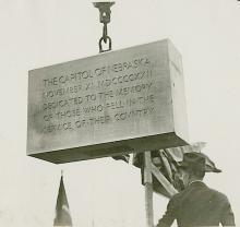 The cornerstone of the Nebraska State Capitol being lowered into place on November 11, 1922. Photo courtesy of History Nebraska