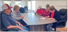 Pictured are from L to R: Sandhills Area Foundation Board member Monty Neiffer, SAF Executive Director Carolyn Moore, Linda Ramos, Katy O’Kief, and Tammy Lutter, co-directors of the Valentine Cat Rescue, signing the pass-through agreement.