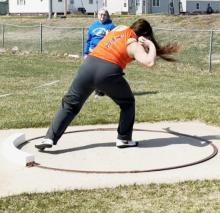 CK freshman, Aubryanna Schmit in mid-throw during competition at the Bassett Track and Field Invite. Photo by Bentley Jenkins