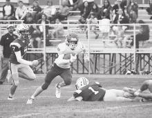 Will Spregner with a run in touchdown! Photos by DeanNa Fowler
