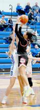 Aiden Hand shoots for two in the girls game vs. O'Neill.