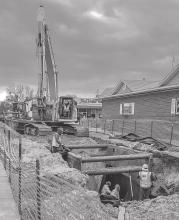 Storm sewer work was going on last week at the intersection of Third and Main, with Coachlight Cafe still open for business. Photos by Laura Vroman