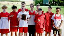 The Varsity boys team earned a runner-up plaque for their second place win. Pictured are from L to R: Boone Jespersen, Tanner Two Strike, Duncan Mosner (back), Isaac Utecht (front), Devlin Welch, Landen Mooney (back), Deklin Titus (front), Allen Ward, and Jackson Huggins. Photos by Harvey Dean Fast Horse