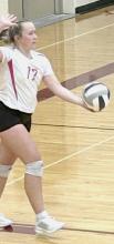 Cadence Swanson with a serve vs Gordon Rushville Photos by Kara Buechle