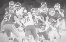 Chase County#36 goes for the Badger QB at the line of scrimmage in the game held Friday September 24, 2021.