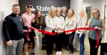 Pictured at the State Farm Ribbon Cutting are from L to R: Zane Limbach, Traven Fletcher, Taylie Fletcher, Leslie Riewe, Robin Wackler, Doug Wackler, Maria Vackiner, Rickilyn Woods, and Jenny Moore.