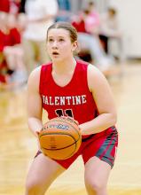 Kimber McGinley pauses before taking a shot! Photo by Kris Larsen