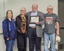 Pictured are OPT Director Jonnie Kusek, Anne Quigley, Andrew Johnson, and Bernie Ekland.