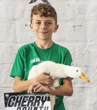 Boe Tetherow with his champion duck.