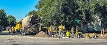 With an extremely hot summer, Kirk Barnes Construction continued to lay the new ADA crosswalks along Highway 12. Photo by Laura Vroman